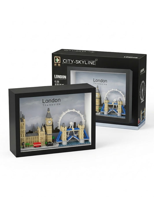 3D London city skyline micro building block set in a black shadow box display frame with retail box, featuring Big Ben, Tower Bridge, and the London Eye.