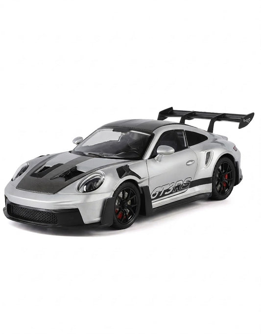 Side three-quarter view of silver Porsche 911 GT3 RS 1:24 scale collectible alloy diecast car on white background