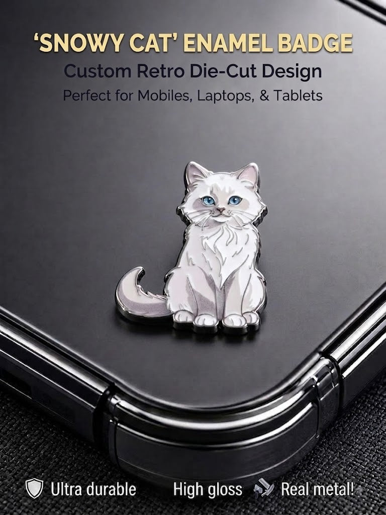 Die-cut Snowy Cat white metal enamel badge sticker with high-gloss finish applied to a black smartphone.
