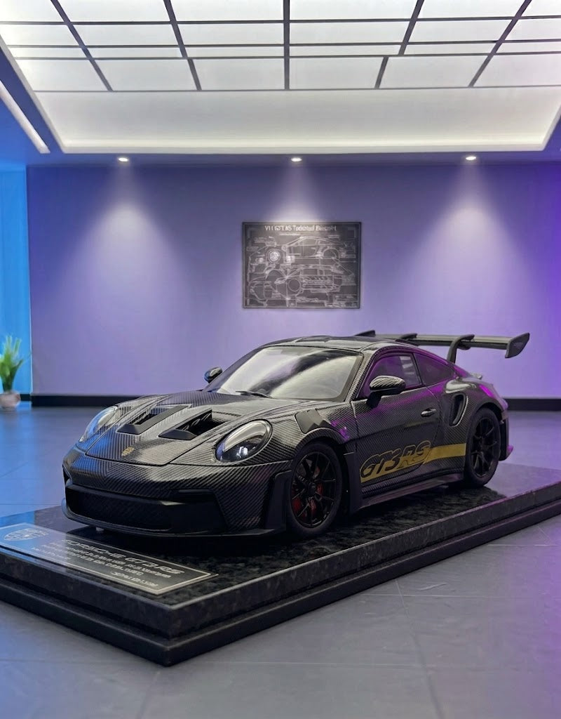 High-detail precision scale diecast model car showcase featuring miniature vehicles and collector scale models