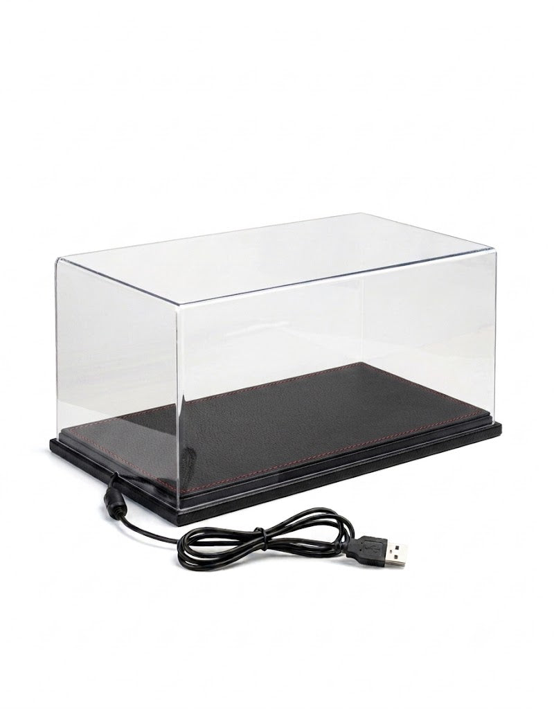 Clear acrylic 1:18 scale model car display case featuring a black leather base with red contrast stitching and integrated USB LED lighting.