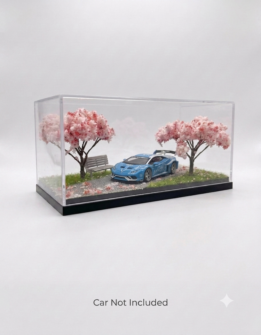 Blue 1:64 diecast sports car displayed inside the Sakura cherry blossom miniature street diorama with clear case.