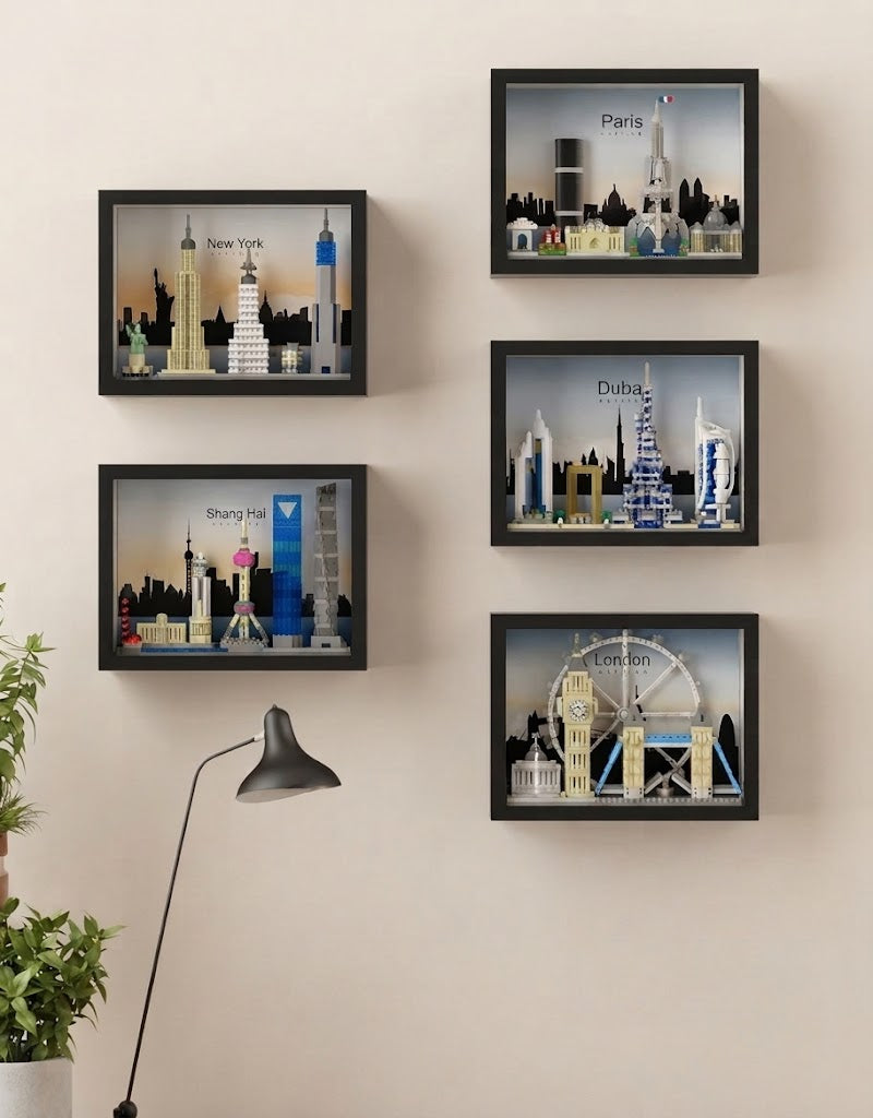 Set of five framed 3D micro block city skylines featuring New York, Paris, Dubai, Shanghai, and London mounted as home wall art.