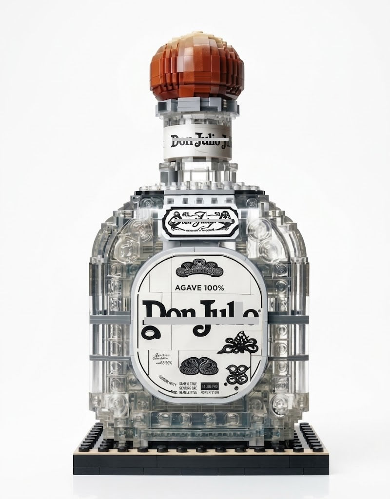 Clear vintage agave decanter bottle building block model kit with an amber dome cap and black display base stand on a white background.