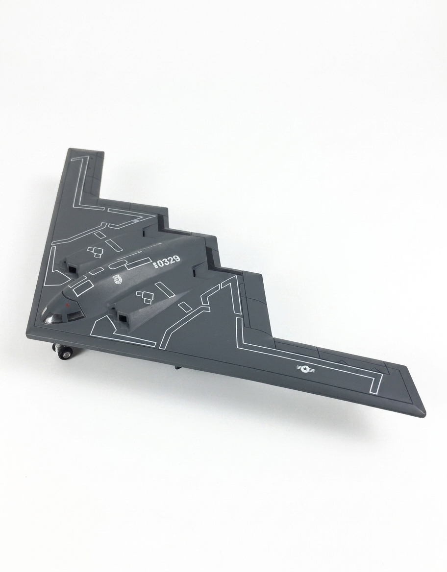 Front angled view of 1:200 scale B-2 Spirit stealth bomber collectible model highlighting cockpit and flying wing design