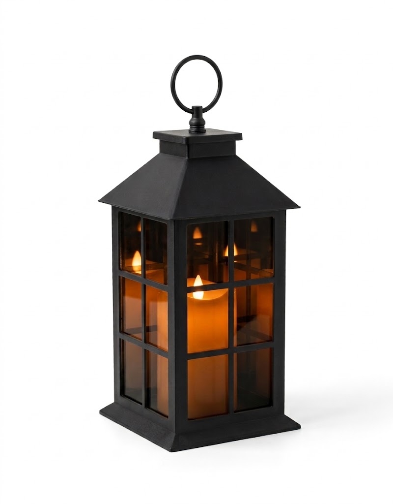 Black decorative lantern with glowing warm flameless LED pillar candle for holiday home decor in Lebanon.