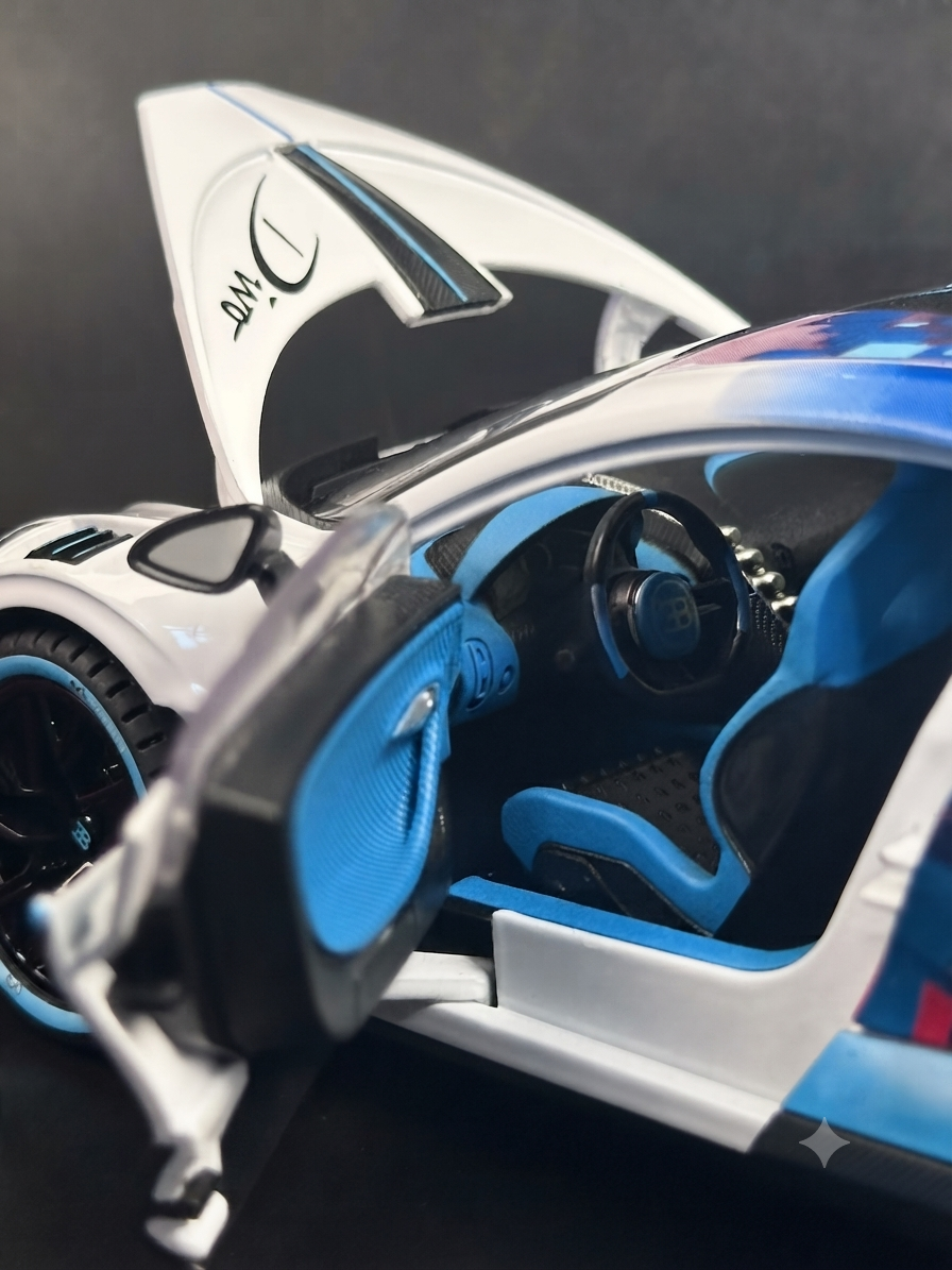 Close-up of open butterfly door and detailed blue-accented cockpit interior of the 1:18 scale Bugatti Divo model car.