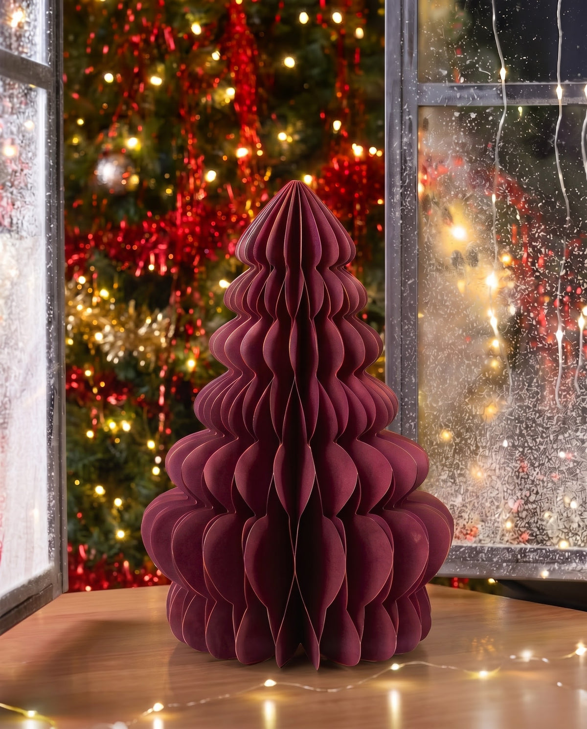Wine red burgundy honeycomb folding paper Christmas tree centerpiece with metallic gold lining, modern holiday tabletop ornament in Lebanon.