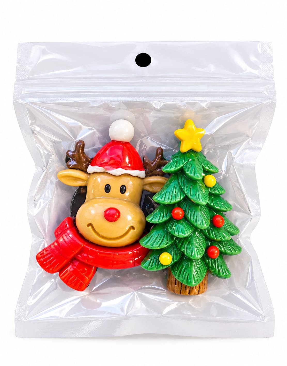 Packaged 2-piece Christmas car air vent clip set featuring a festive reindeer wearing a Santa hat and a decorated Christmas tree in a clear protective pouch.