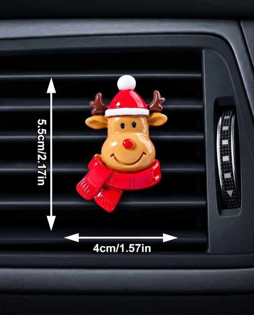 Cute reindeer car air vent clip in a red Santa hat and scarf mounted on a black AC vent, measuring 5.5 cm in height and 4 cm in width.