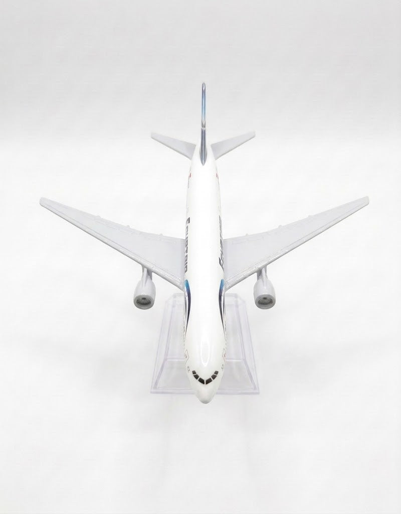 Overhead top-down view of EgyptAir Boeing 777 metal diecast airplane showing 15cm wingspan, cockpit details, and wing structure