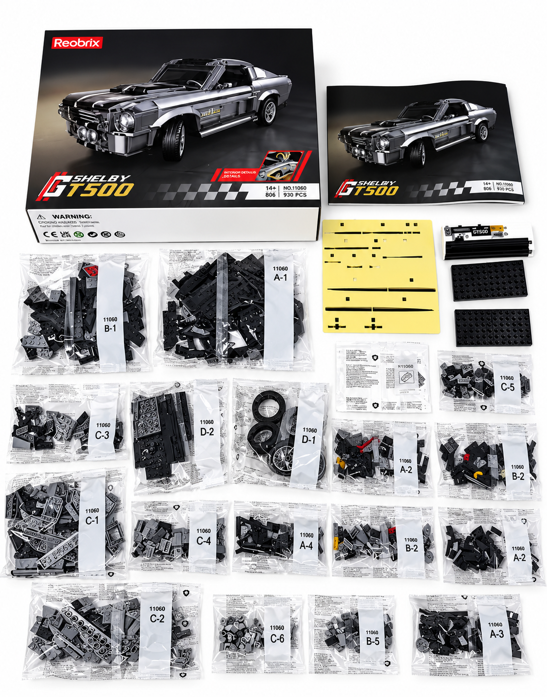 Unboxing the Eleanor GT500 DIY building block car kit showing numbered piece bags, rubber tires, decals, and step-by-step instruction manual.