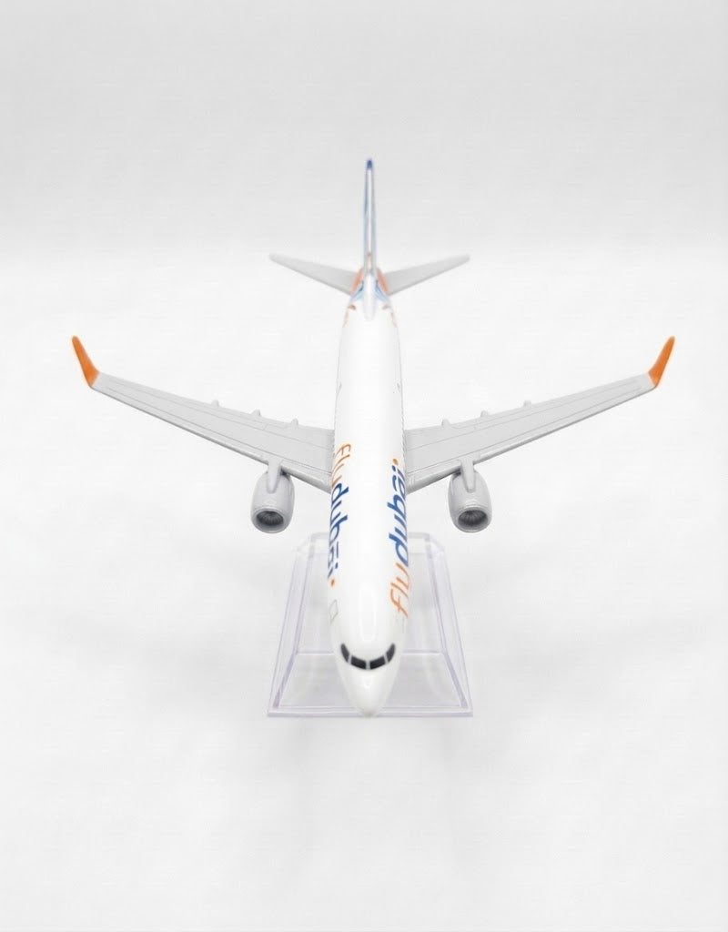Front top-down view of Flydubai diecast model aircraft showcasing wing details, twin jet engines, and airline branding.