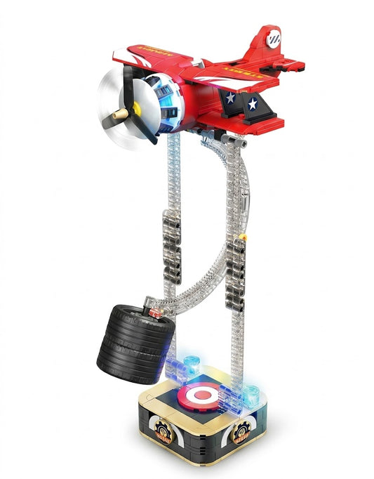 Red biplane building block model suspended on a clear curved gravity pendulum with an illuminated LED base.