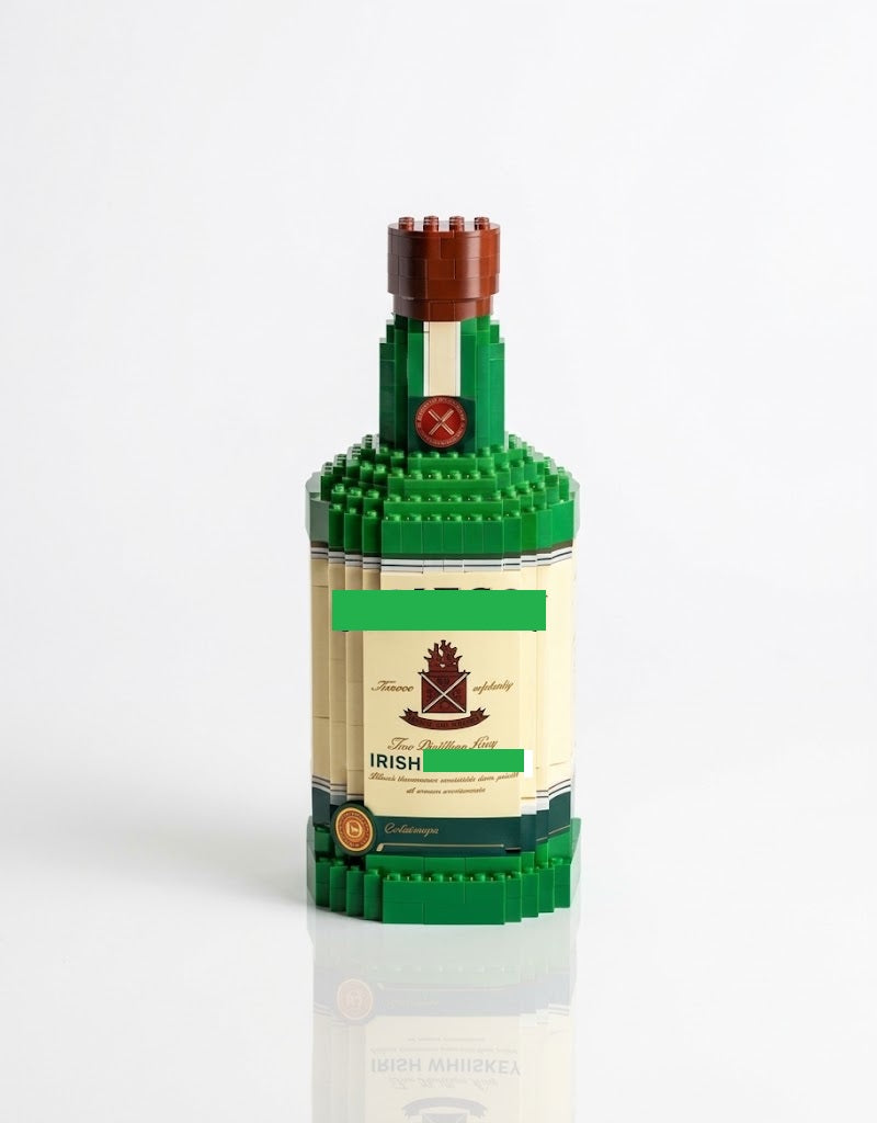 Green Irish vintage collector bottle building block model kit featuring a cream label with heritage crest detailing and a brown stopper cap on a white background.