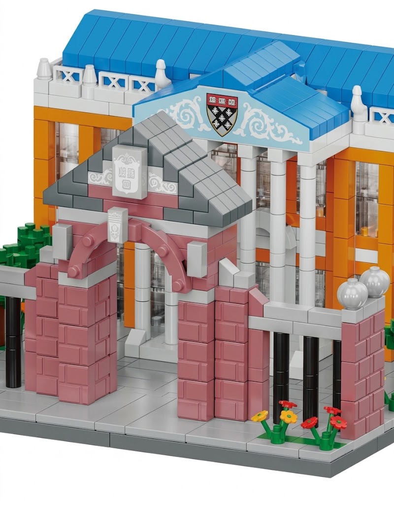 Detailed close-up of the brick entrance gate, columns, and school crest on the Harvard University building block set, shop online in Lebanon.