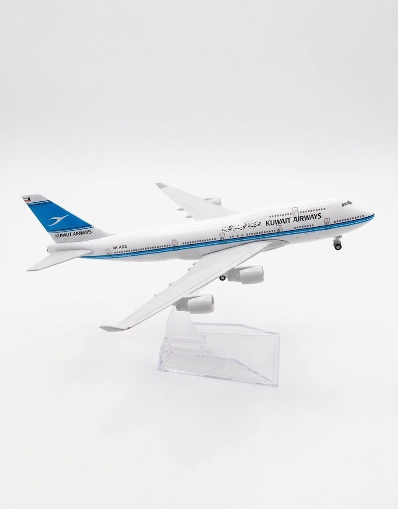 Side profile view of Kuwait Airways 9K-ADE Boeing 747 diecast metal scale model airplane on display stand