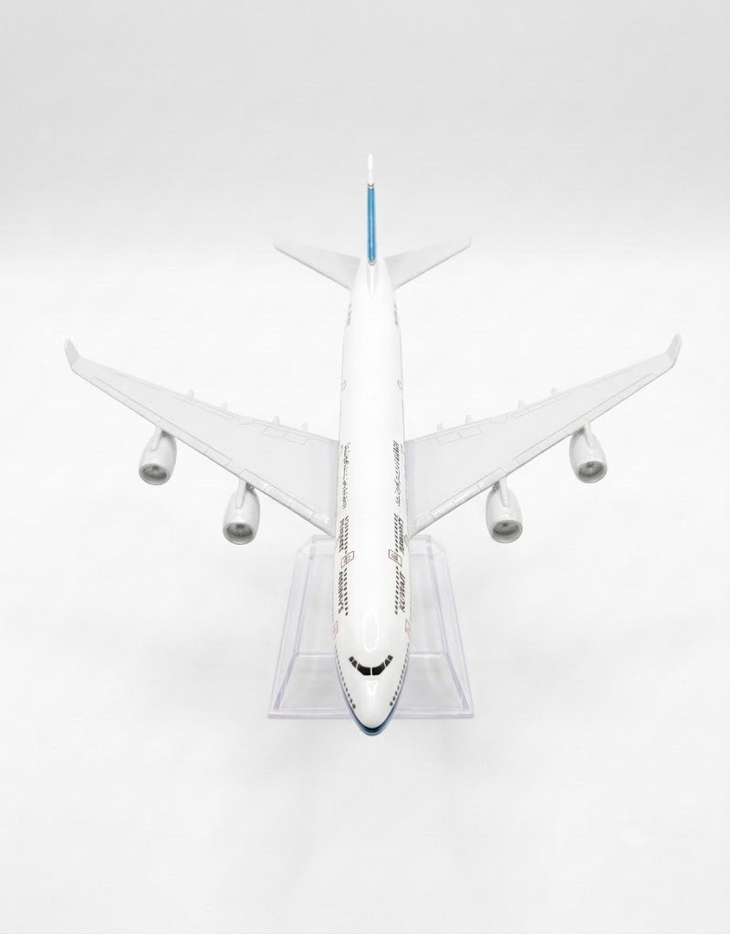 Top-down front view showing wingspan, turbine engines, and fuselage of Kuwait Airways collectible metal aircraft model