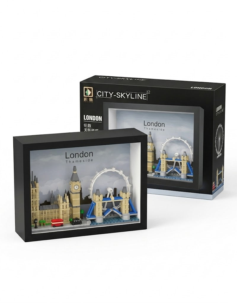 3D London city skyline micro building block set in a black shadow box display frame with retail box, featuring Big Ben, Tower Bridge, and the London Eye.