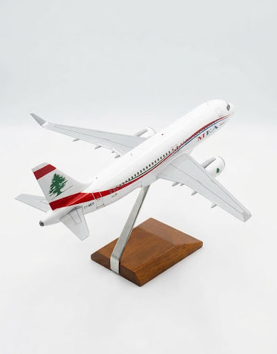 Elevated rear view of MEA Airbus A320 scale model aircraft showing cedar tree tail livery on display stand