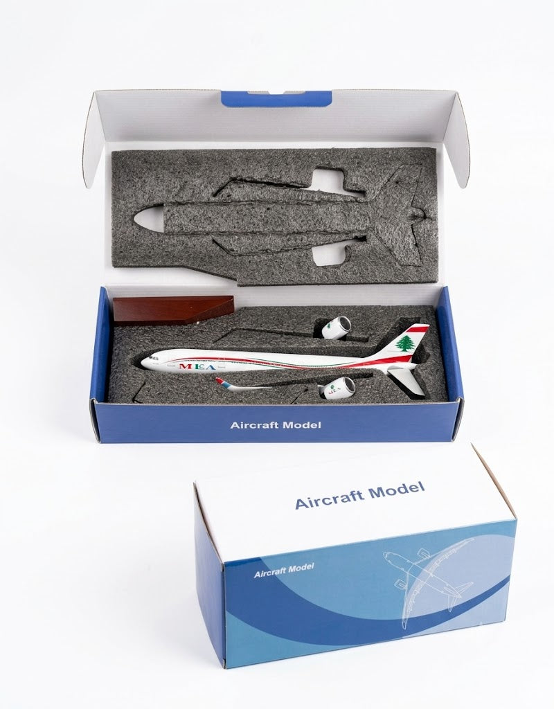 Unassembled MEA Middle East Airlines Airbus A320 airplane model kit in custom foam-padded gift box packaging.