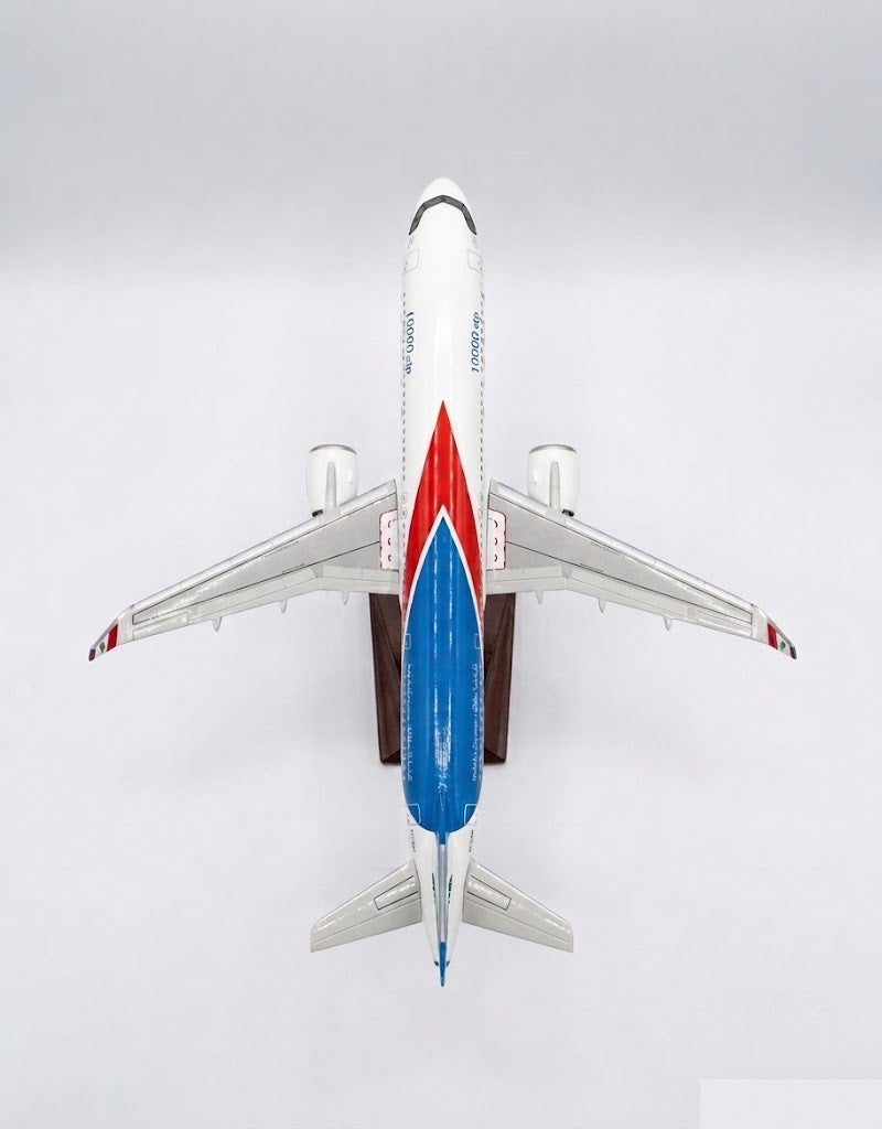 Top-down aerial perspective of MEA Airbus A321neo display model displaying fuselage roof livery, wing sweep, and sharklets.