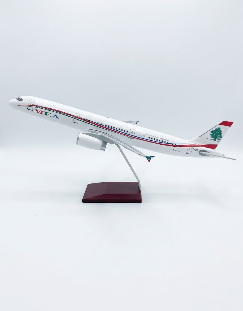 Complete side profile of MEA Air Liban Airbus 1:100 scale collector model plane showing national livery, red fuselage cheatline, and Cedar tailfin.
