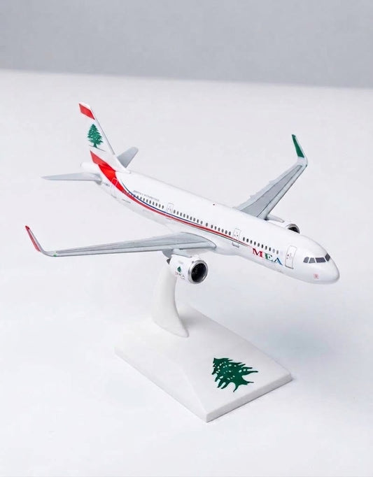 1:200 scale Middle East Airlines MEA Airbus A320 resin airplane model on a white display stand with Lebanese cedar emblem.