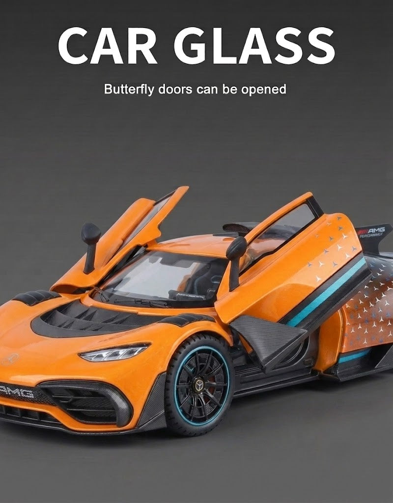 Front view of orange 1:24 Mercedes-AMG One diecast model with open upward butterfly doors and detailed interior