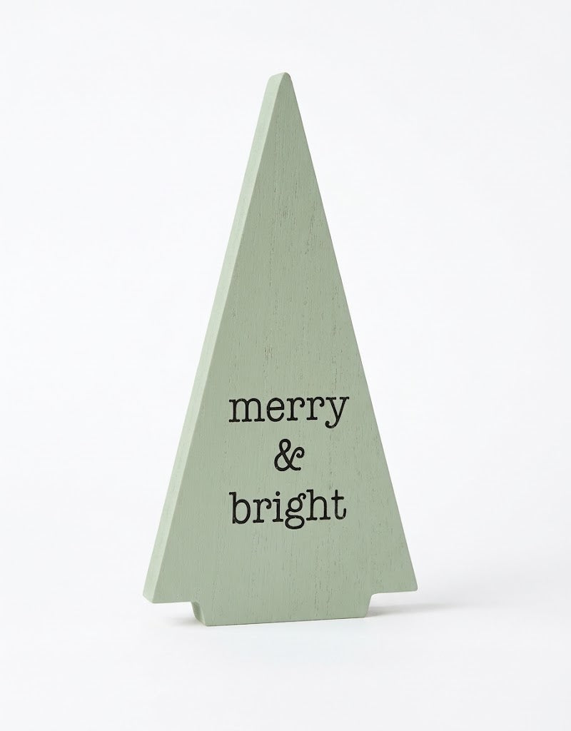 Sage green wooden Christmas tree tabletop decor featuring "merry & bright" typography, available online in Lebanon.