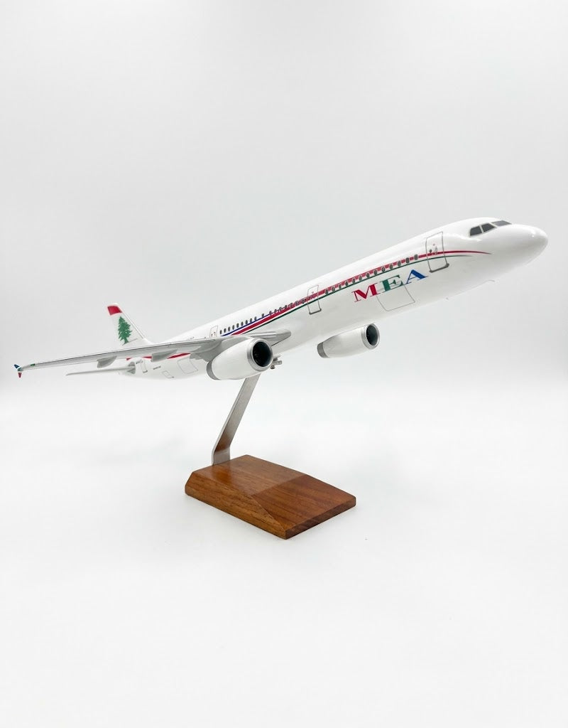 Side view of 30cm MEA Middle East Airlines Airbus A320 collector desktop aircraft model showing fuselage and engine detailing.