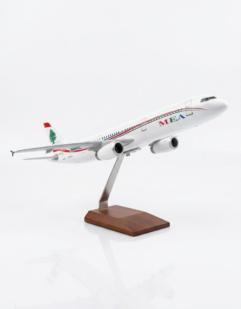 Underside climbing flight view of 45cm MEA Middle East Airlines Airbus model aircraft featuring Cedar emblem engine nacelles and display mount.