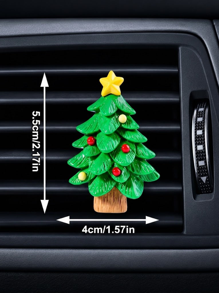 Detailed green Christmas tree car air vent clip with colorful baubles and a yellow star on an AC vent slat, measuring 5.5 cm tall by 4 cm wide.