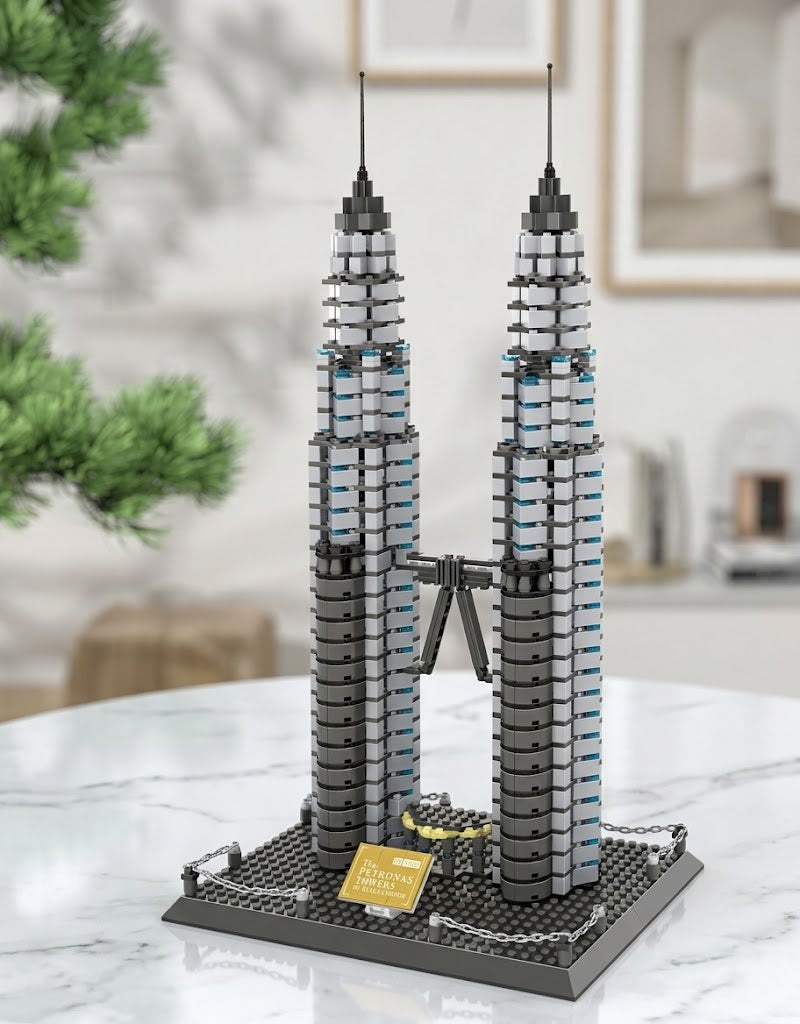 Completed Petronas Twin Towers architectural block set displayed on marble table as desk decor, available at Gadgets Lebanon.