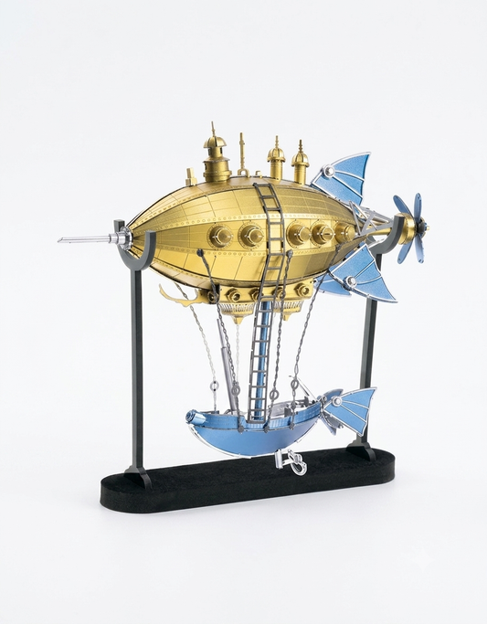 Fully assembled Piececool Victoria Steamship 3D metal puzzle airship in gold and blue on display stand