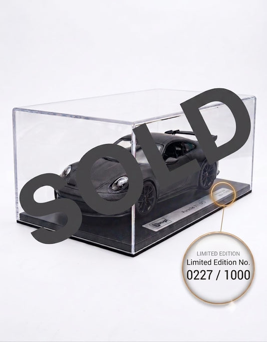 VIP Models Porsche 911 GT3 in full carbon fiber finish inside clear acrylic display case, limited edition collectible scale model car.