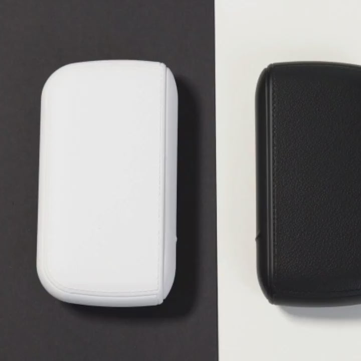 Demonstration of waterproof textured leather cigarette case with built-in rechargeable USB electronic lighter, drop-tested and available in Lebanon.