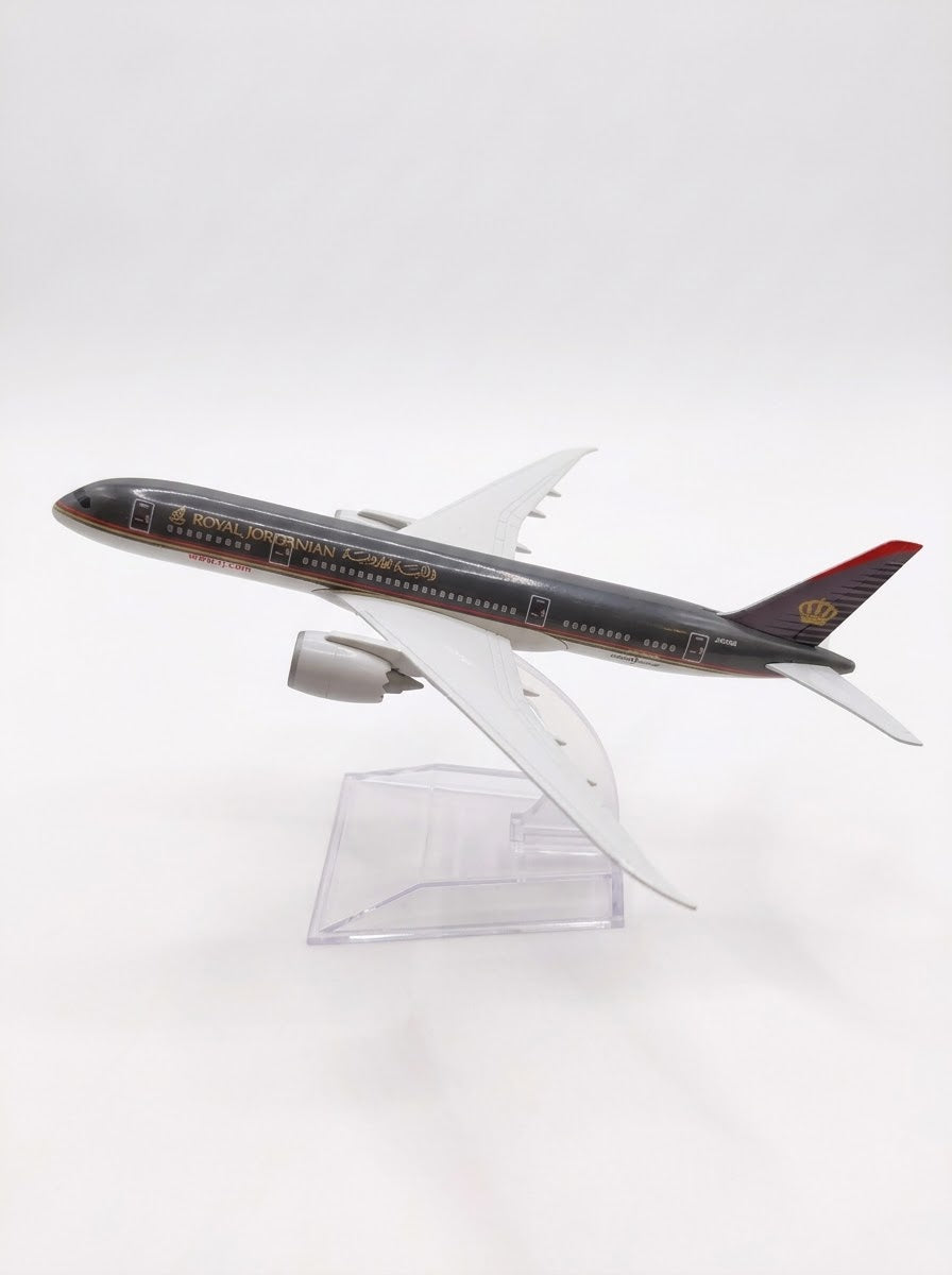 Royal Jordanian Boeing 787 Dreamliner 15cm diecast metal airplane model on clear display stand, left side profile – aviation collectible available in Lebanon.