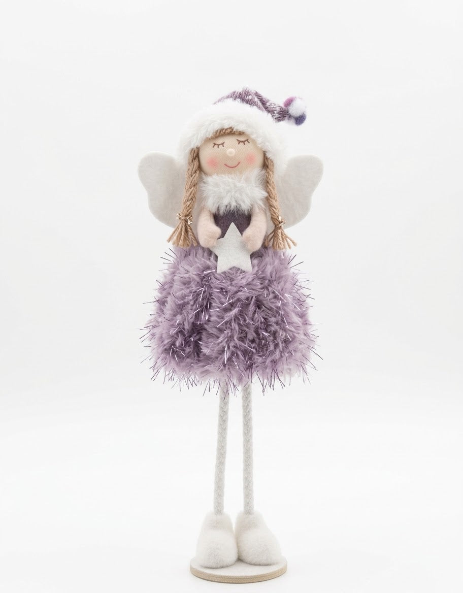 Freestanding plush holiday fairy doll in a soft lilac purple faux-fur skirt and pom-pom beanie holding a white star.