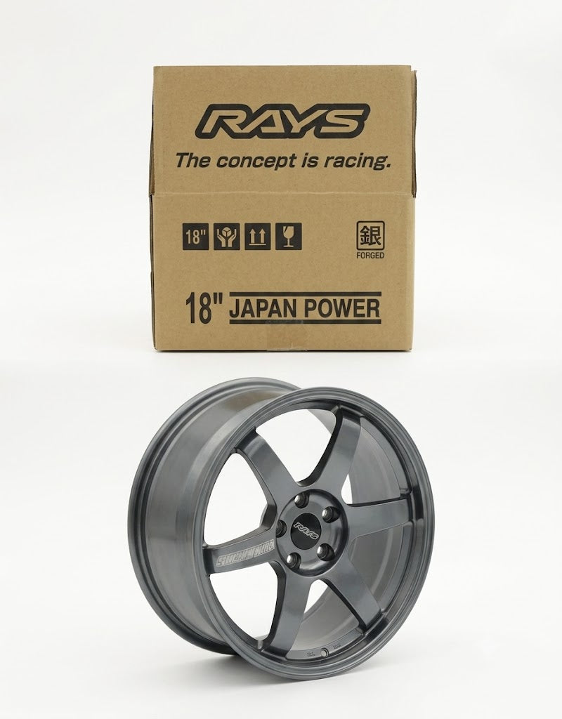 Gunmetal 6-spoke TE37 style 10cm diecast aluminum rim model displayed next to miniature replica wheel box.