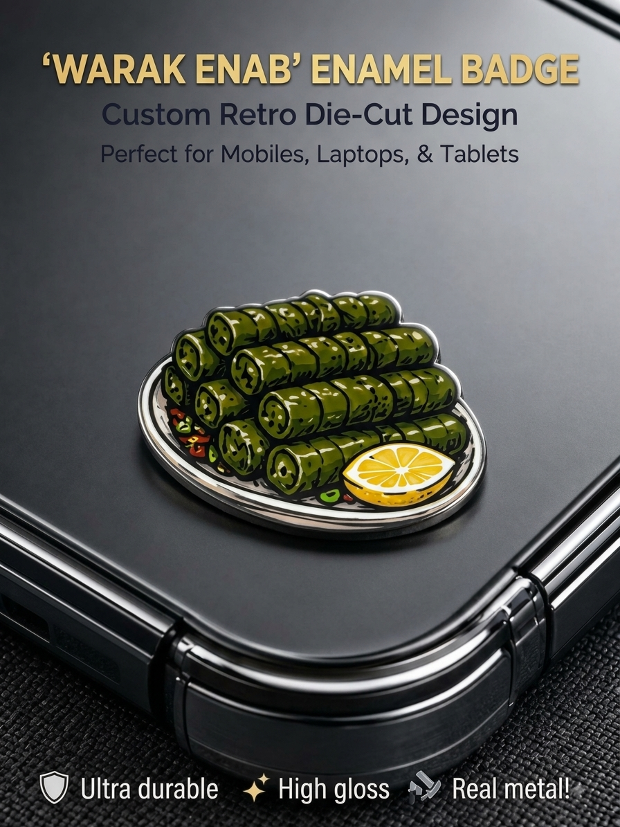 Die-cut Warak Enab stuffed grape leaves enamel metal badge sticker with lemon wedge attached to the back of a phone