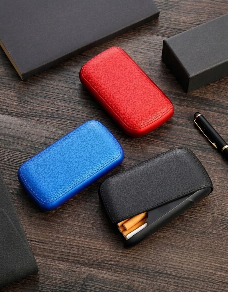 Waterproof leather-finish cigarette case with built-in electronic lighter shown in black, red, and blue in Lebanon.
