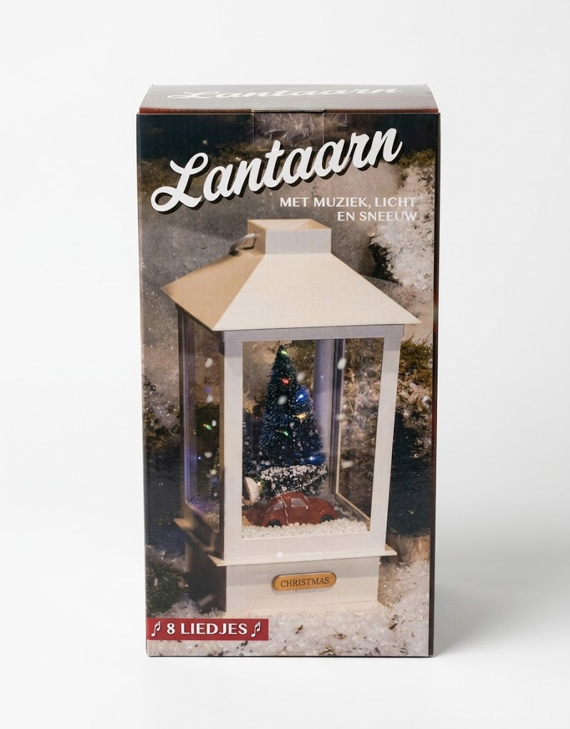 Original packaging box for illuminated white Christmas snow globe lantern holiday tabletop decoration in Lebanon.