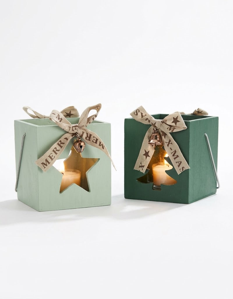 Pair of wooden Christmas tealight candle holders with star and tree cutouts and burlap ribbons, available in Lebanon.